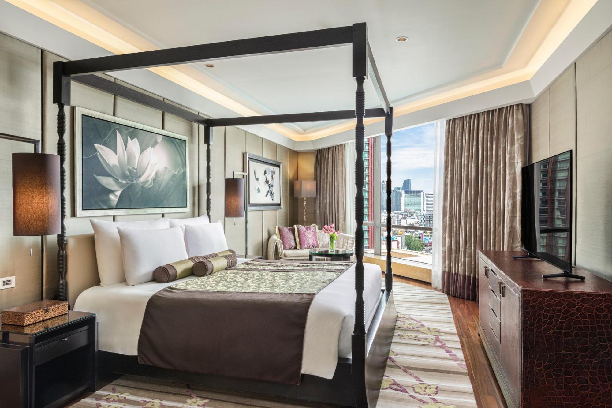 Siam Kempinski Hotel Bangkok Kültér fotó A bedroom at the hotel